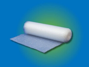 A roll of plastic bubble wrap lying on its side.